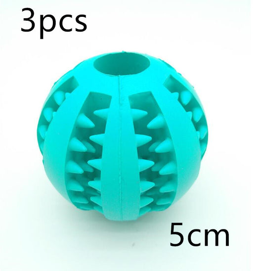 Teal rubber slow feeder dog toy ball with internal spikes for teeth cleaning and treat dispensing, 7cm size. - Image 7