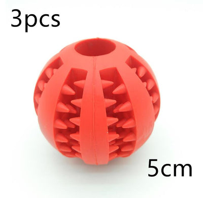 Teal rubber slow feeder dog toy ball with internal spikes for teeth cleaning and treat dispensing, 7cm size. - Image 8