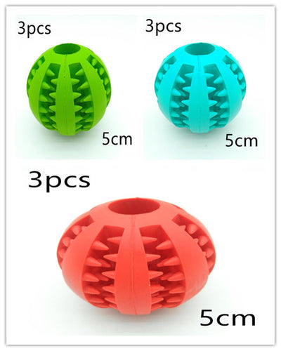 Teal rubber slow feeder dog toy ball with internal spikes for teeth cleaning and treat dispensing, 7cm size. - Image 13