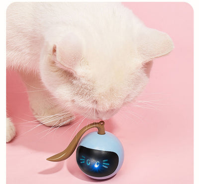 Yellow spherical cat toy with a black face panel, glowing blue eyes and whiskers, and a grey tail. - Image 18