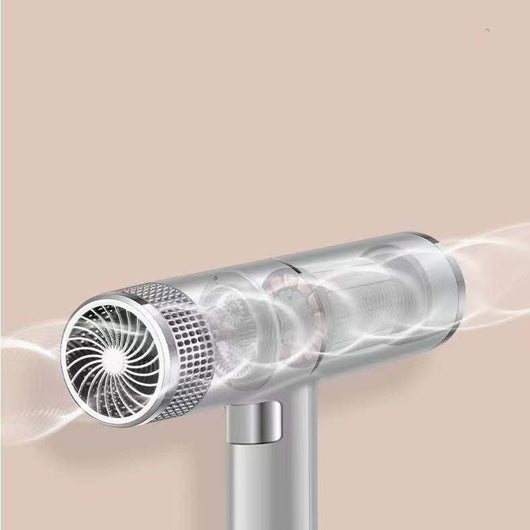 Green and silver compact hair dryer with a T-shaped design, featuring multiple control buttons and a ribbed cord protector. - Image 2
