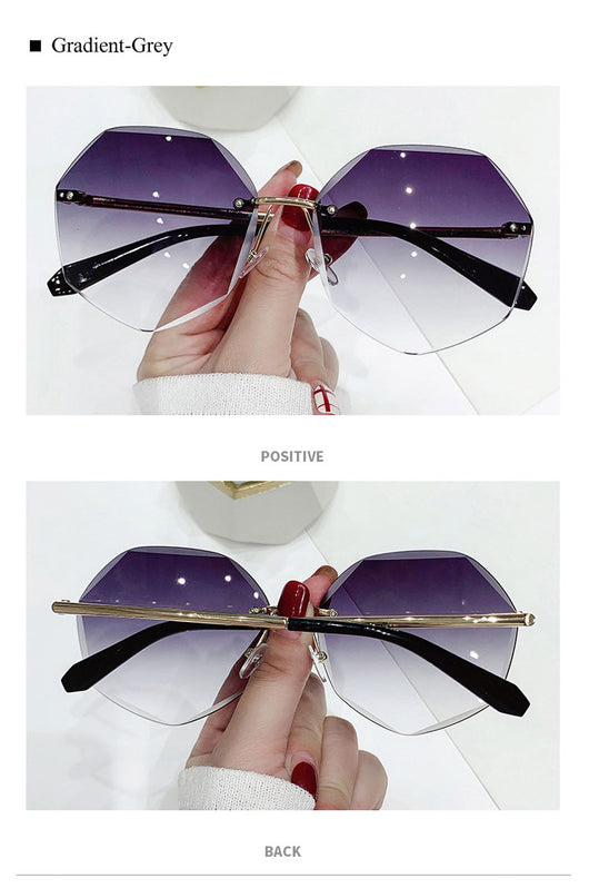 Ladies' cut-edge polygonal sunglasses with gradient purple-to-pink lenses and black temples, held by a hand. - Image 2