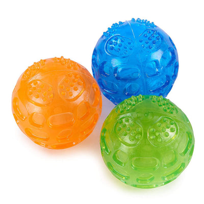 Orange rubber pet toy ball with an openwork design and textured nubs, ideal for puppies' biting and molars. - Image 8