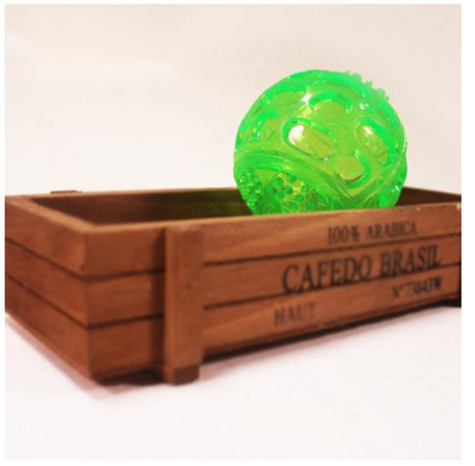 Orange rubber pet toy ball with an openwork design and textured nubs, ideal for puppies' biting and molars. - Image 5
