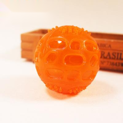 Orange rubber pet toy ball with an openwork design and textured nubs, ideal for puppies' biting and molars. - Image 6