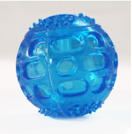 Orange rubber pet toy ball with an openwork design and textured nubs, ideal for puppies' biting and molars. - Image 4