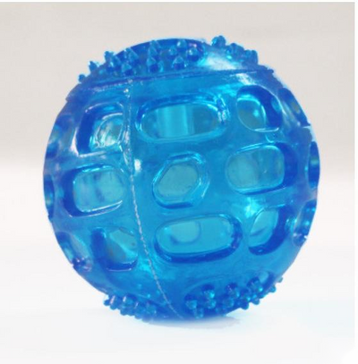 Orange rubber pet toy ball with an openwork design and textured nubs, ideal for puppies' biting and molars. - Image 4