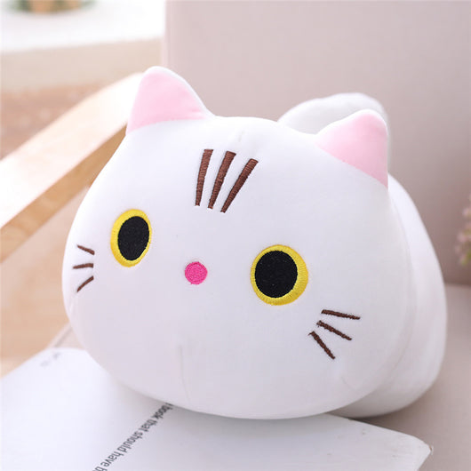 Cute orange cat plush doll with pink ears, black eyes, and embroidered whiskers, resting on a white book. - Image 7