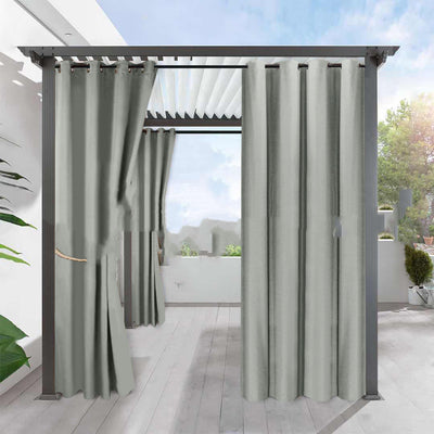 Light gray blackout curtains with grommets hanging from a dark gray pergola on an outdoor patio. - Image 4