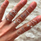 Anillo de Plata Antigua con Hoja de Pluma y Nudo Infinito