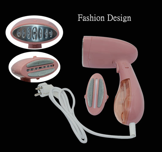 Pink handheld garment steamer with a clear water tank, silver soleplate, and a detachable brush attachment. - Image 7