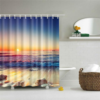 Shower curtain with a vibrant 3D digital print of a sunset over a beach, featuring crashing waves and distant boats.