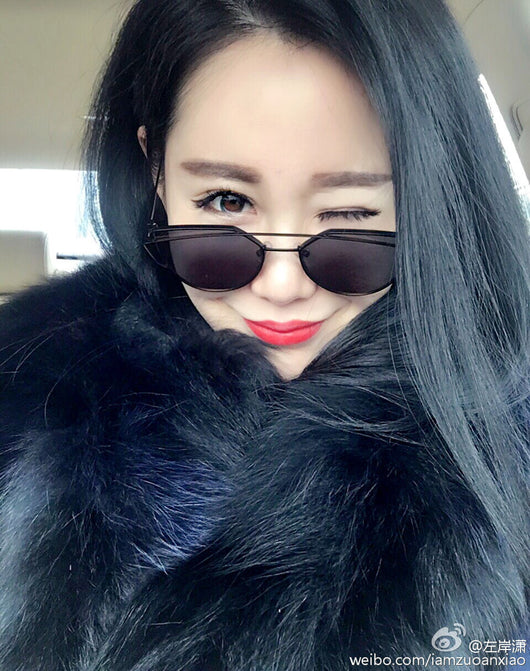 Ultralight women's cat-eye sunglasses with a gold metal frame, dark gray lenses, and a distinctive double bridge. - Image 15