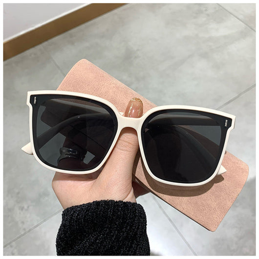 Two pairs of square-frame sunglasses, one with a cream frame and dark lenses, the other with a translucent brown frame and brown lenses. - Image 6