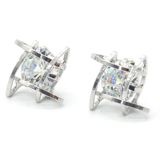 Gold-tone square stud earrings with clear zircon gemstones set in a hollow tic-tac-toe geometric frame. - Image 4