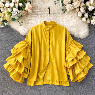 Blusa Elegante con Volantes Multicapas y Mangas Acampanadas