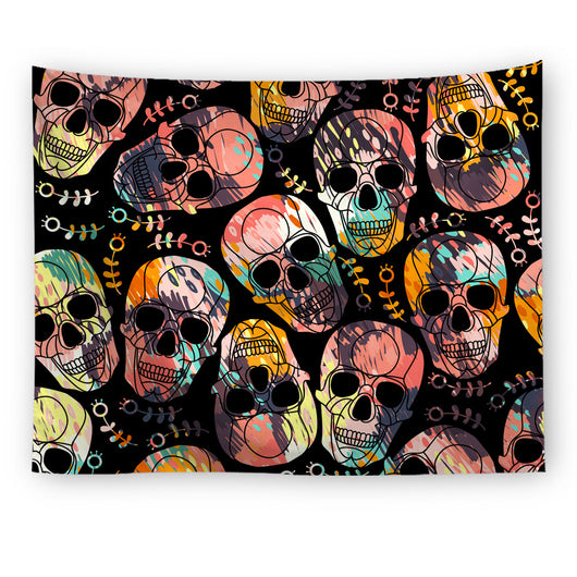 Black tapestry with a repeating pattern of stylized red and yellow skulls and white paint splatters.