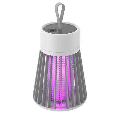 White and grey electric mosquito killer lamp with a purple UV light, featuring a conical cage and top handle. - Image 3