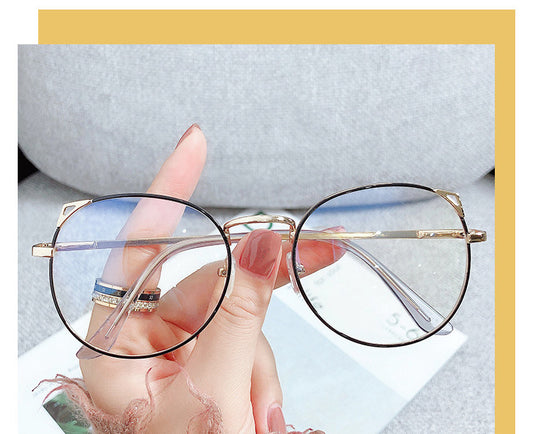 Gold metal cat ear frame anti-blue light myopia glasses held by a hand, featuring round lenses and a full frame. - Image 2
