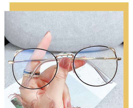 Gold metal cat ear frame anti-blue light myopia glasses held by a hand, featuring round lenses and a full frame. - Image 2