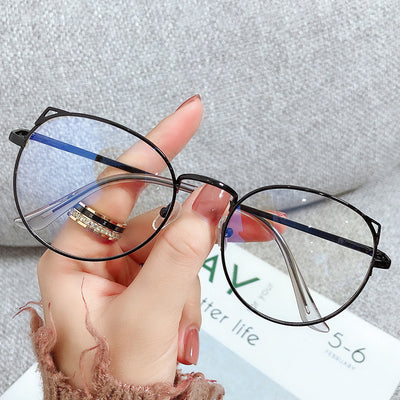 Gold metal cat ear frame anti-blue light myopia glasses held by a hand, featuring round lenses and a full frame. - Image 3