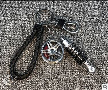 Llavero Amortiguador de Rueda Turbo - Accesorio Personalizado para Auto