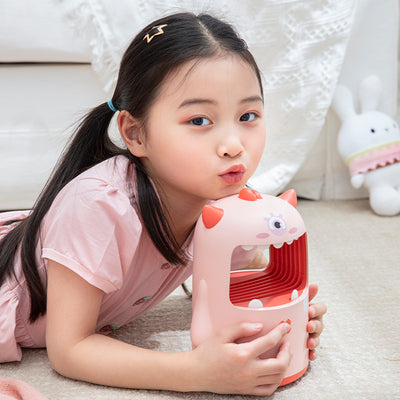 Pink monster-shaped mosquito killer lamp with a wide open mouth, horns, and a small red cross detail. - Image 7