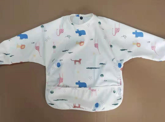 Delantal Impermeable con Bolsillos para Bebé - Protección Total Durante Comidas - Image 9