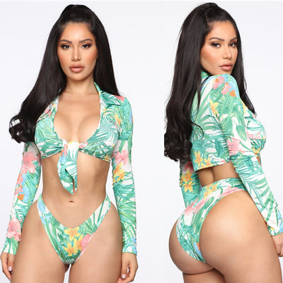 Plus size woman in a tropical print long-sleeve, tie-front crop top and high-waisted bikini bottoms. - Image 12