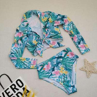 Plus size woman in a tropical print long-sleeve, tie-front crop top and high-waisted bikini bottoms. - Image 7