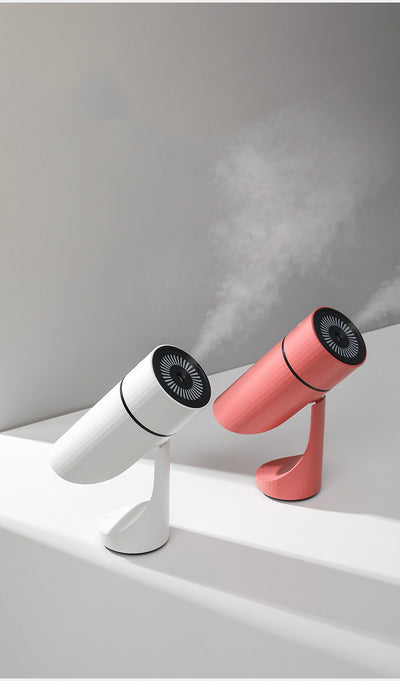Teal cylindrical USB charging humidifier with a ribbed texture, black water level indicator, and two control buttons. - Image 10