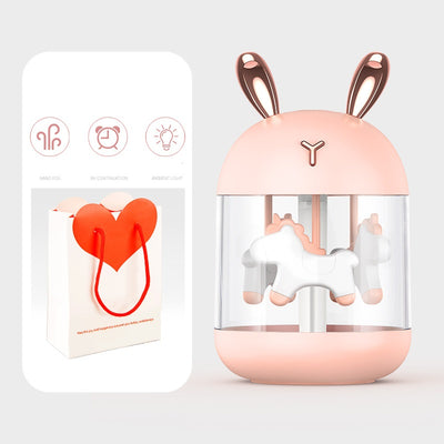 White dream pony humidifier with rose gold deer antlers and a clear tank showing a white carousel pony. - Image 13