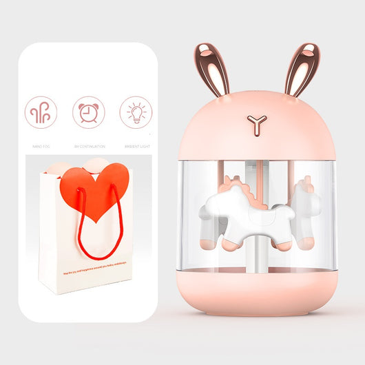 White dream pony humidifier with rose gold deer antlers and a clear tank showing a white carousel pony. - Image 6
