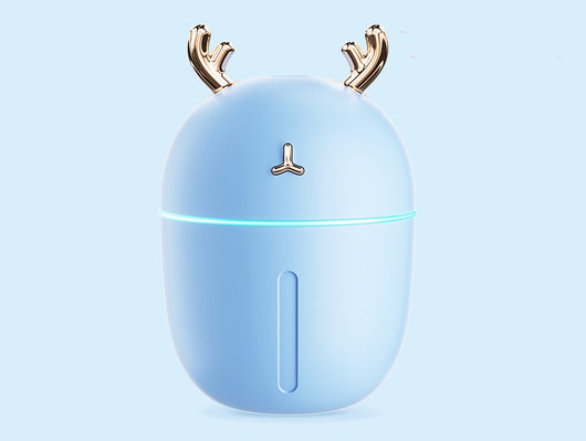 Pink egg-shaped humidifier with gold deer antlers, a deer head logo, and a glowing purple light band. - Image 10