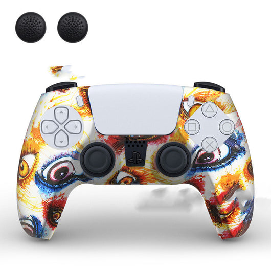 PS5 controller with a white silicone sleeve featuring a vibrant, abstract eye pattern, shown with two black thumb grip caps. - Image 23