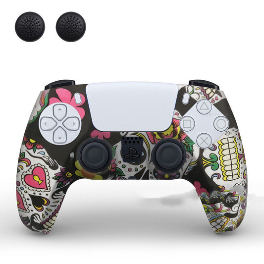 PS5 controller with a white silicone sleeve featuring a vibrant, abstract eye pattern, shown with two black thumb grip caps.
