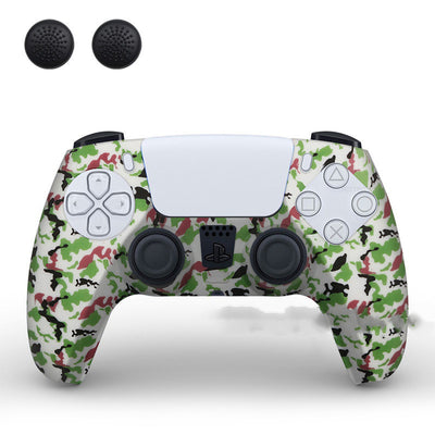 PS5 controller with a white silicone sleeve featuring a vibrant, abstract eye pattern, shown with two black thumb grip caps. - Image 3