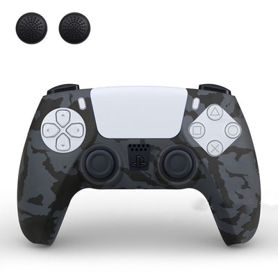 PS5 controller with a white silicone sleeve featuring a vibrant, abstract eye pattern, shown with two black thumb grip caps. - Image 6
