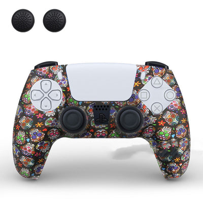 PS5 controller with a white silicone sleeve featuring a vibrant, abstract eye pattern, shown with two black thumb grip caps. - Image 11