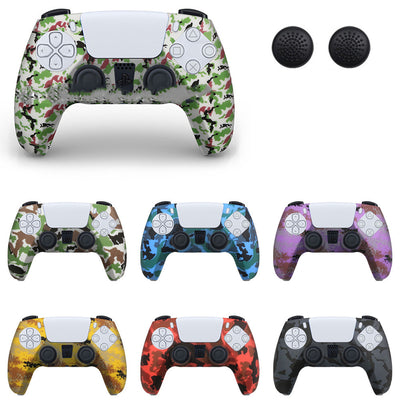 PS5 controller with a white silicone sleeve featuring a vibrant, abstract eye pattern, shown with two black thumb grip caps. - Image 14