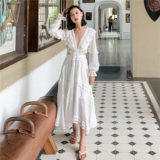 Vestido Blanco Elegante con Cintura Ajustable y Falda Amplia