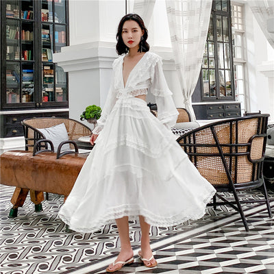 Vestido Blanco Elegante con Cintura Ajustable y Falda Amplia - Image 4