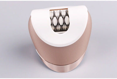 White and rose gold rechargeable epilator with a power button and an epilating head for whole body hair removal. - Image 5