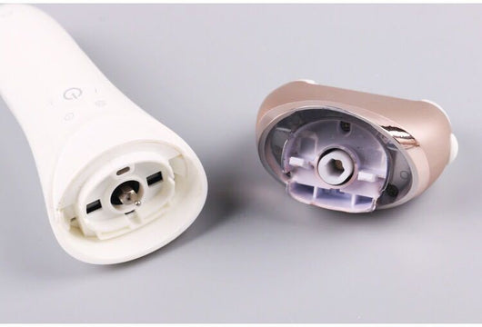White and rose gold rechargeable epilator with a power button and an epilating head for whole body hair removal. - Image 12