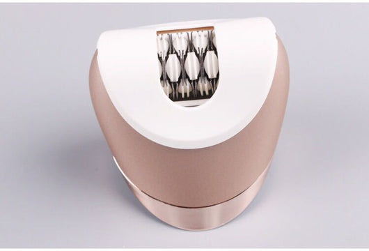 White and rose gold rechargeable epilator with a power button and an epilating head for whole body hair removal. - Image 9