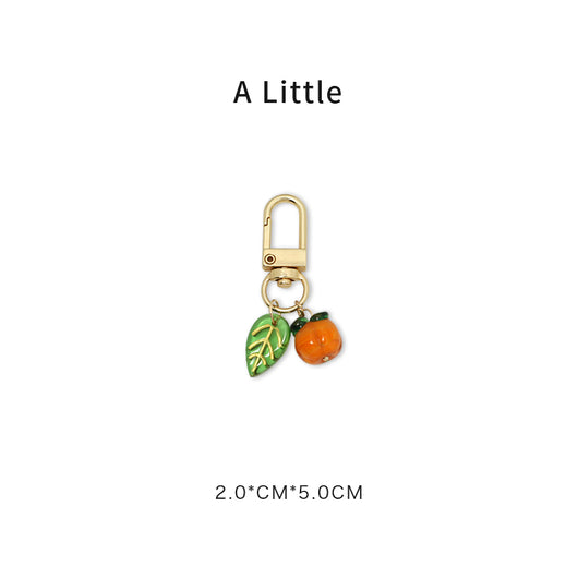 Llavero de Hojas de Caqui en Metal – Regalo de Bendición - Image 4