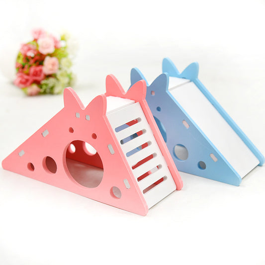 Blue and white hamster slide hut made from wood plastic board, featuring a triangular house design with a slide.