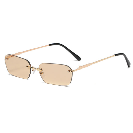 Rimless rectangular sunglasses with light blue lenses, gold-colored metal temples, and black ear tips. - Image 3