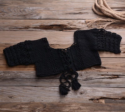Black crocheted off-the-shoulder crop top with short sleeves and a lace-up front featuring tassels. - Image 8