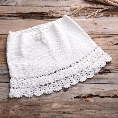 Black crocheted off-the-shoulder crop top with short sleeves and a lace-up front featuring tassels. - Image 9